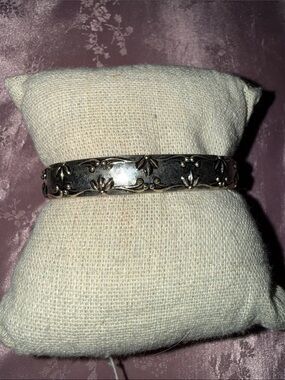 Avon Silvertone cuff bracelet